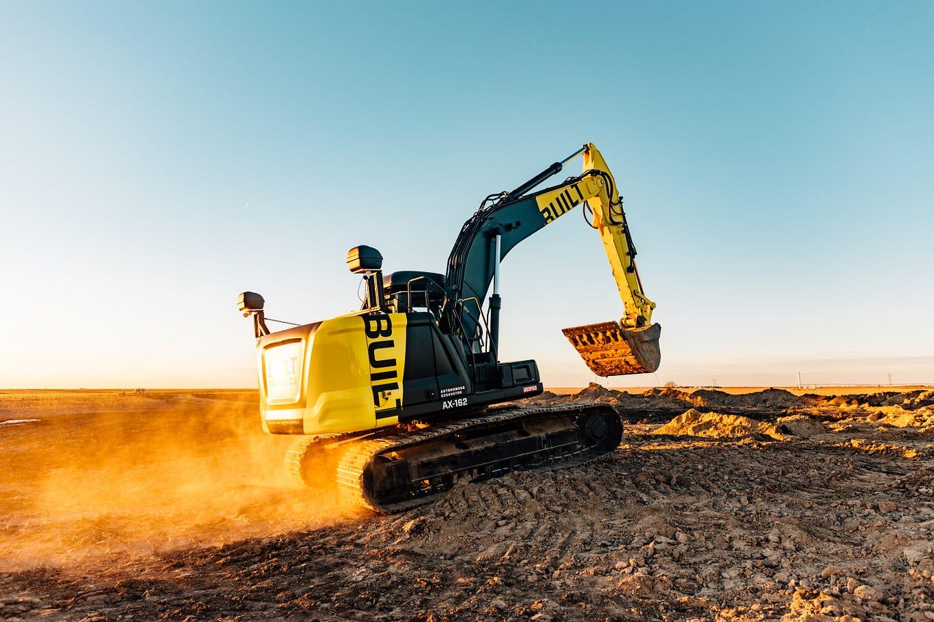 Autonomous excavator operating on a construction site using robotics, AI, sensors, and autonomous technology.